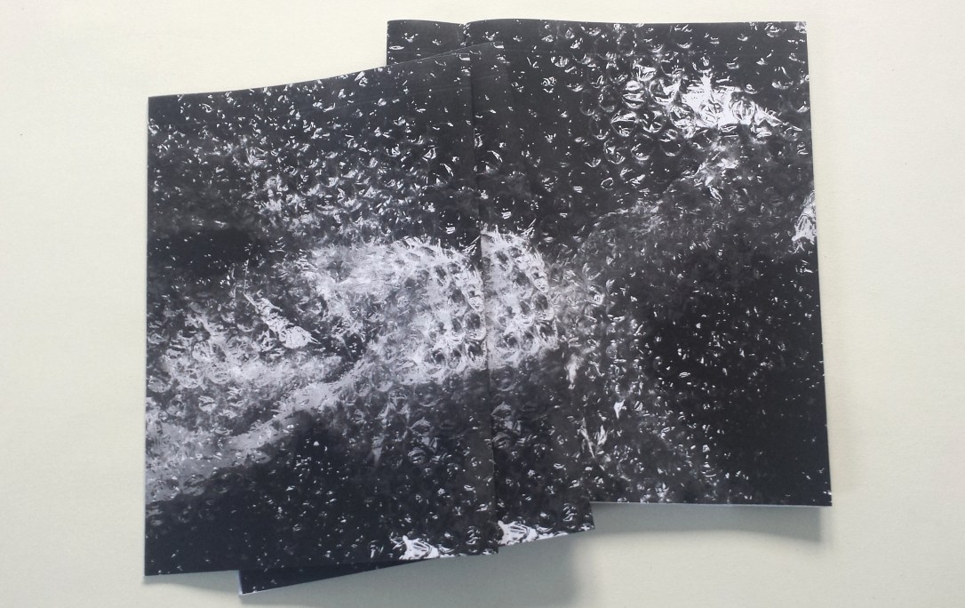 David Patrick Chocolate Leatherette page spread